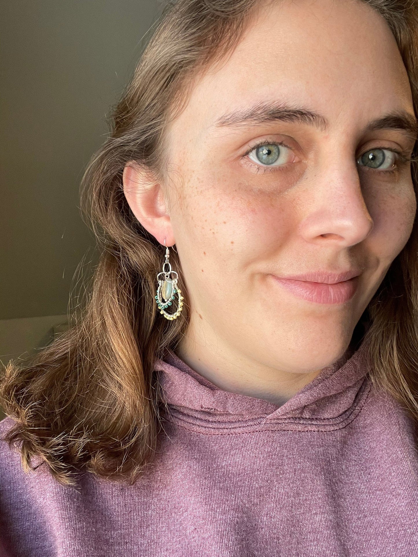 Layered Wire Wrapped Hoop Earrings With Green Center Stone, Green and Yellow accents.